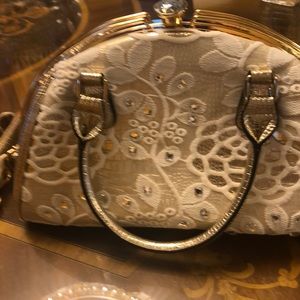NWOT, dressy gold and white clasp bag